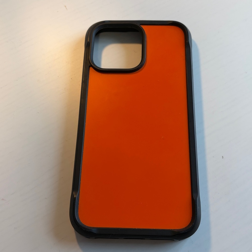 Nomad iPhone 14 Pro Max Case orange and black